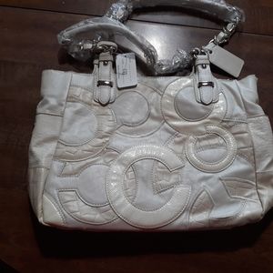 Knock-off cream colored purse